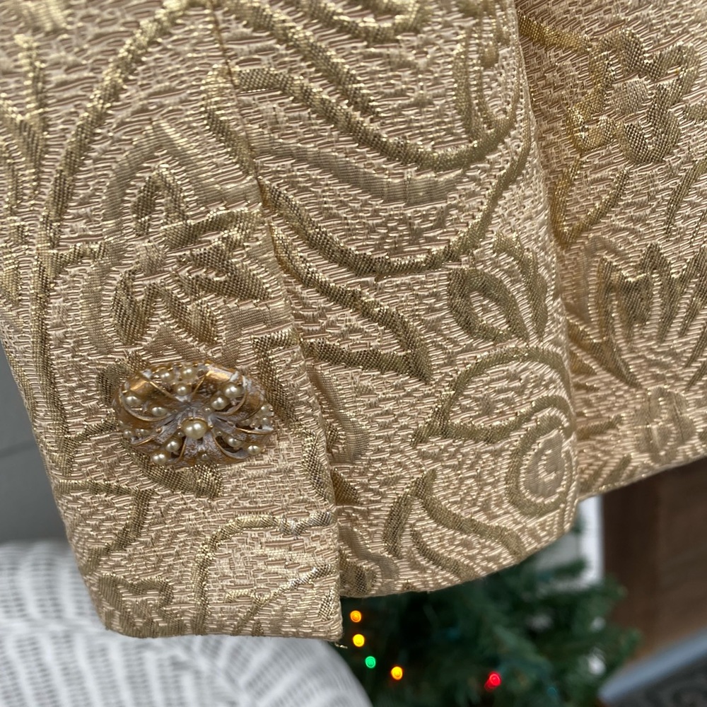Dana Buchman gold jacket w/pearl buttons. Size 2.